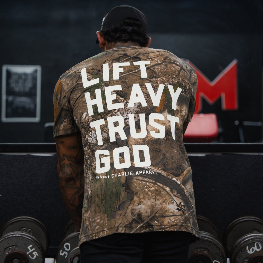 Lift Heavy. Trust God. - Realtree Premium Camo Tee
